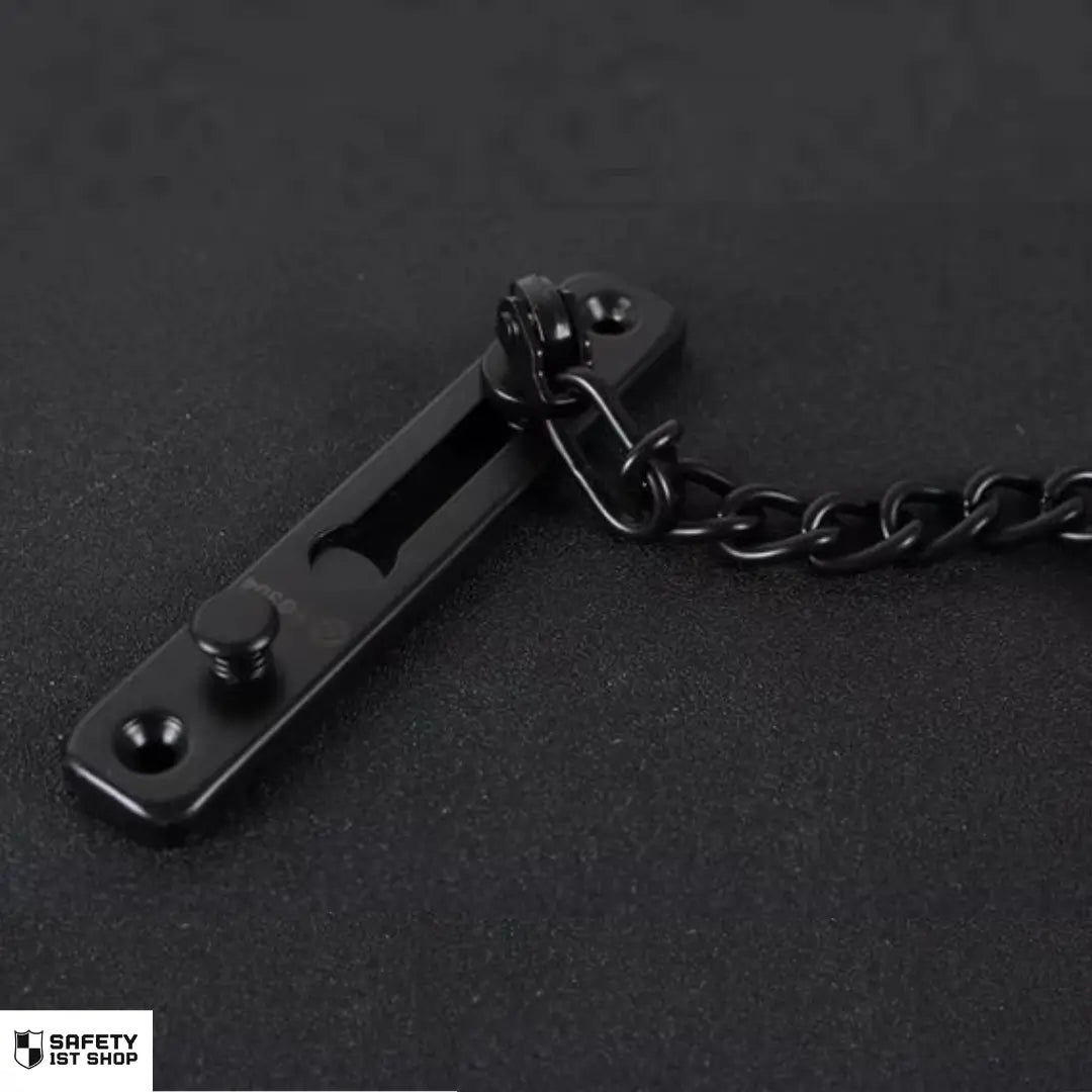 Elegant black stainless steel door chain lock displayed on a dark background for modern home security