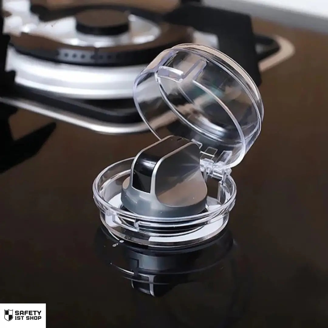 Clear stove knob safety cover installed on luxury gas cooktop – elegant child protection