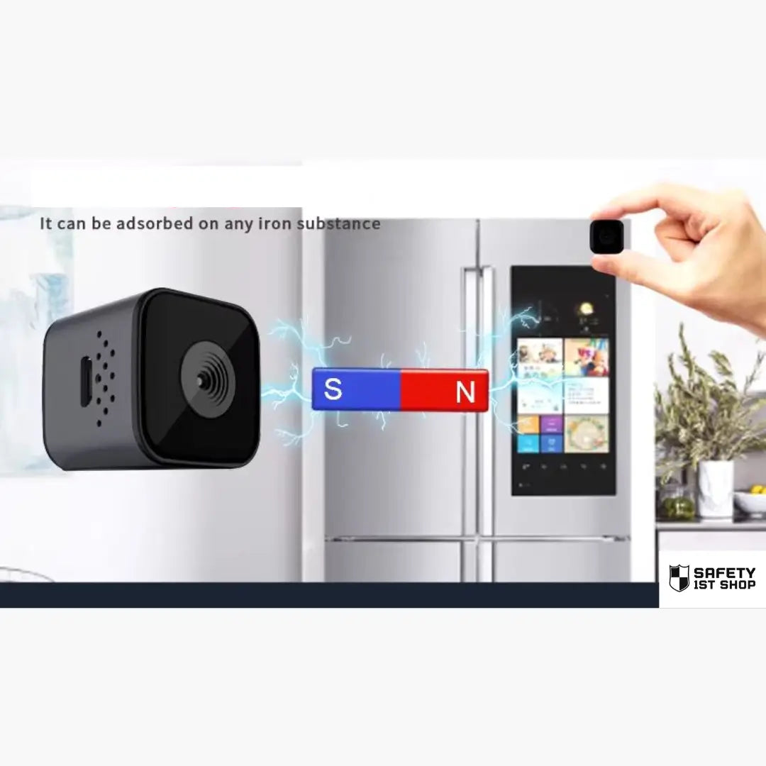 Mini waterproof camera magnetically attached to a silver refrigerator with lightning effect, held between fingers to show compact size and easy mounting on any iron surface
