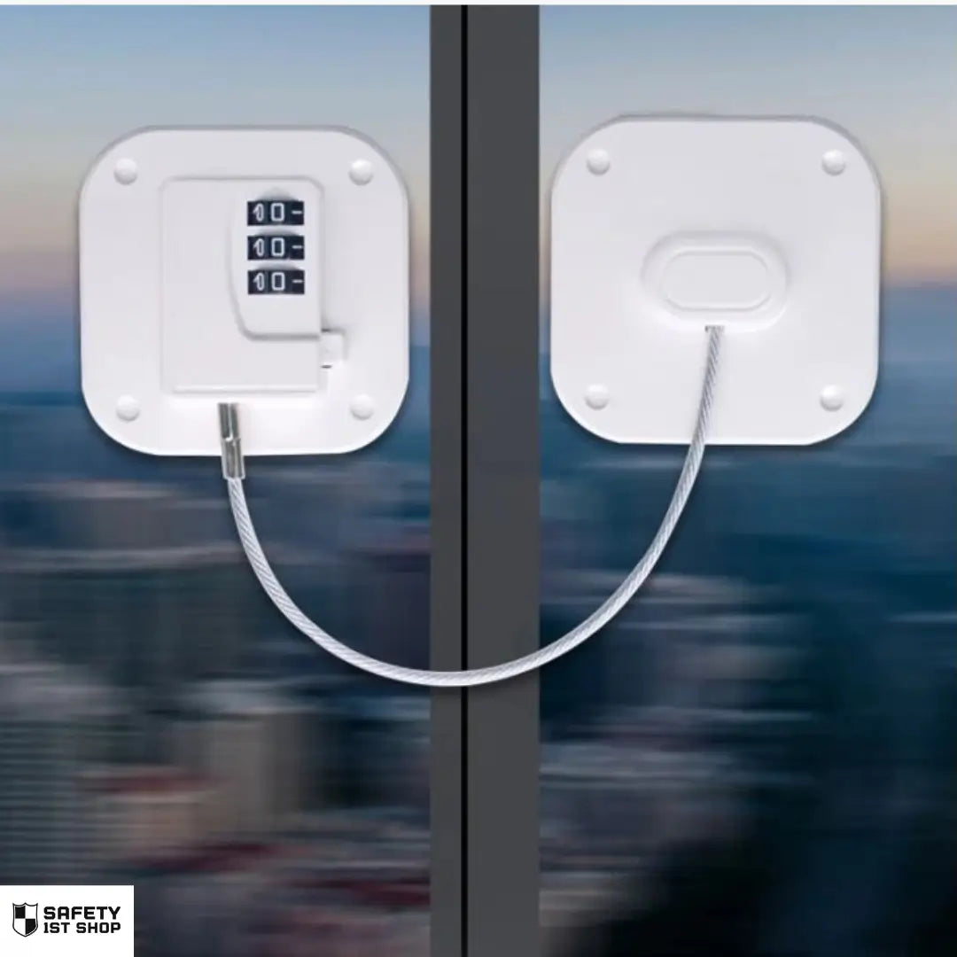White childproof window lock with code dial, installed to limit access and enhance toddler safety