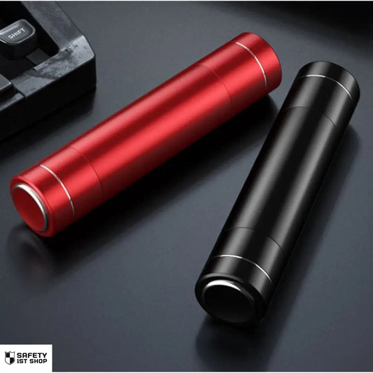 Red and black emergency car safety hammers on dark surface – sleek lifestyle product photo with visible shift key