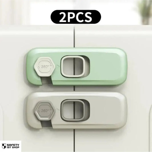 Child safety lock in grey and green mounted on a white drawer – secure babyproofing solution with modern design