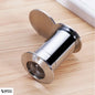Close-up of elegant silver door viewer on beige laminated surface, showcasing fine details and premium craftsmanship