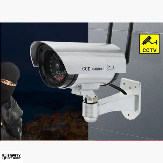 realistic dummy surveillance camera mounted on wall with burglar in scene, effective home security deterrent