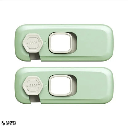 Set of two light green child safety locks on white background – clean product display