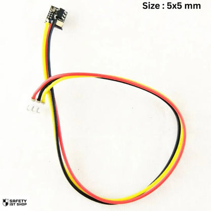Mini spy camera with 5x5mm lens and color-coded cables on white background