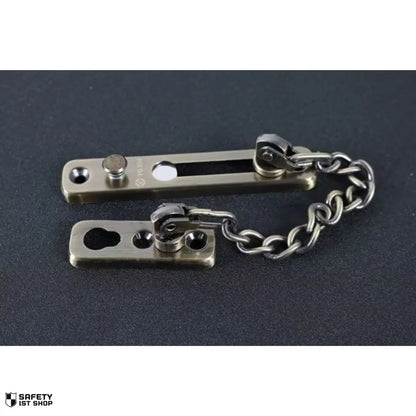 Sleek silver stainless steel door chain lock presented on a dark background for stylish home security