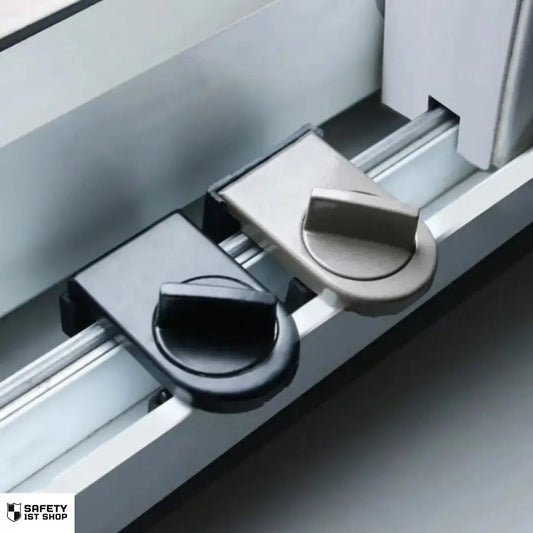 Childproof window safety lock shown in black and brown variants, securely mounted on a window – ideal for preventing wide openings and unauthorized access.